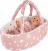 A baby doll in a pink bassinet with a pacifier and blanket. Produktbild-Vorschau