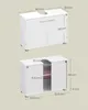 Two views of a white bathroom vanity cabinet, with dimensions indicated. Náhled obrázku produktu