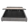 A bed frame with the mattress support lifted, showing the storage space underneath. Produktbild-Vorschau