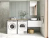 A modern laundry room with a stacked washer and dryer, a sink, and a mirror. Produktbild-Vorschau