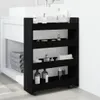 A slim, black, four-tier storage cart with wheels, placed next to a white bathroom vanity with a sink. The cart holds various toiletries and towels. Podgląd zdjęcia produktu