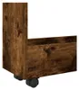 A close-up view of the bottom corner of a wooden storage cart with wheels. Náhled obrázku produktu