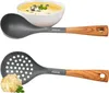 A soup ladle and a slotted spoon are shown against a white background, with a bowl of soup and a dumpling. Anteprima dell’immagine prodotto