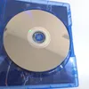 A close-up view of a video game disc inside its blue plastic case. Produktbild-Vorschau