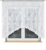 A white lace curtain with a floral pattern hangs over a window. Náhled obrázku produktu