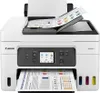 A white Canon MAXIFY GX4040 printer is shown from the front, with paper loaded in the input tray and the output tray. Náhled obrázku produktu
