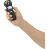 A hand holding a black digital voice recorder. Anteprima dell’immagine prodotto