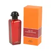 A bottle of Hermes Eau de Rhubarbe Ecarlate Eau de Cologne and its orange packaging are displayed against a white background. Produktbild-Vorschau
