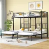 A children's bunk bed with two lower beds and one upper bed, set up in a bedroom with decorations. Voir les images du produit