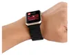 A person's wrist wearing a smartwatch with a black band. Náhled obrázku produktu