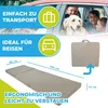 A collage of images showing a folded mattress, a mattress in use, and people with a dog in a car. Produktbild-Vorschau