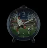 A close-up of an alarm clock with a football player graphic on the face. Produktbild-Vorschau