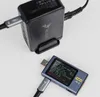 A black GaN charger and a USB tester are shown on a white background. Anteprima dell’immagine prodotto