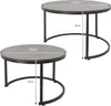 Two round coffee tables of different sizes, shown from a slightly elevated angle against a white background. Dimensions are indicated with measurement lines and text. Produktbild-Vorschau
