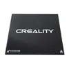 A black glass plate with the Creality logo printed on it, set against a white background. Náhľad obrázku produktu