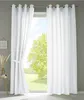 A room with a window covered by white curtains, showing a green tree and blue sky outside. Produktbild-Vorschau
