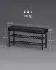 A black shoe bench with two shelves is shown with dimensions and weight capacity overlaid. The background is a plain gray. Náhled obrázku produktu