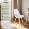 A white chair with wooden legs is shown next to a table, with curtains in the background. A panel on the left details the chair's features. Náhled obrázku produktu