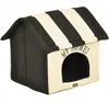 A striped dog or cat house. Produktbild-Vorschau