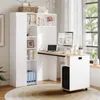 A white bookshelf and desk combination with a computer and laptop on the desk, set up in a room with natural light from a window. Produktbild-Vorschau
