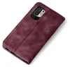 A burgundy flip cover case for a smartphone is shown on a white background. Produktbild-Vorschau