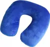 A blue U-shaped pillow on a white background. Náhled obrázku produktu