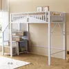 A white loft bed with stairs and storage is shown in a room with light beige walls and a wooden floor. Náhled obrázku produktu