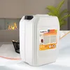 A white plastic jerrycan of bioethanol is placed in front of a modern fireplace with flames, a coffee table, and a plant in the background. Produktbild-Vorschau