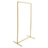 A gold metal arch stand on a white background. Produktbild-Vorschau