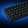 Close-up of a black mechanical keyboard with blue backlighting against a dark blue gradient background. Produktbild-Vorschau