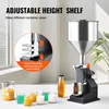 A filling machine with a funnel and a small bottle being filled, surrounded by small containers of colorful liquids and a beaker. Voir les images du produit