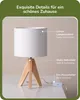 A white table lamp with a wooden tripod base is shown on a white surface. Produktbild-Vorschau