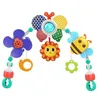 A baby play arch with attached toys, including a flower, sun, and bee. Náhled obrázku produktu