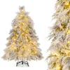 A flocked artificial Christmas tree with warm white LED lights and a metal stand, presented against a white background. Voir les images du produit