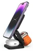 A black 3-in-1 wireless charging stand holding a purple iPhone, a white pair of AirPods, and an orange Apple Watch. Podgląd zdjęcia produktu
