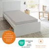 A mattress on a bed in a room. Produktbild-Vorschau