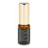 A product shot of a perfume bottle with a gold cap and a black label. Produktbild-Vorschau