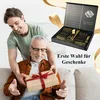 A young man is giving a gift to an older man, with a cutlery set box in the background. Produktbild-Vorschau