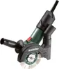 A close-up studio shot of a Metabo angle grinder with a dust extraction shroud and diamond cutting disc. Produktbild-Vorschau