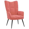 A pink velvet armchair with black legs is shown against a white background. Náhľad obrázku produktu