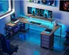 A gaming desk setup with LED lighting in a room. Anteprima dell’immagine prodotto