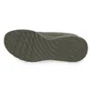 The sole of a green sneaker is shown against a white background. Anteprima dell’immagine prodotto