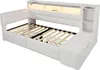 A white upholstered daybed with a slatted mattress base and integrated storage and shelving units. Produktbild-Vorschau