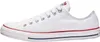 A side view of a white Converse All Star low-top sneaker. Voir les images du produit