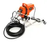 An orange and silver airless paint sprayer system with a black hose, displayed on a white background. Produktbild-Vorschau