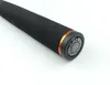 A close-up shot of the handle of a fishing rod, showing the brand logo on the end cap. Produktbild-Vorschau