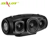 A black portable wireless speaker with multiple speaker drivers is shown against a white background. Produktbild-Vorschau