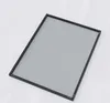 A rectangular mirror with a black frame is shown on a light gray and white background. Produktbild-Vorschau