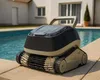A pool cleaning robot sits on the edge of a swimming pool. Produktbild-Vorschau