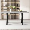 A dining table in a modern room setting with shelves in the background. Produktbild-Vorschau